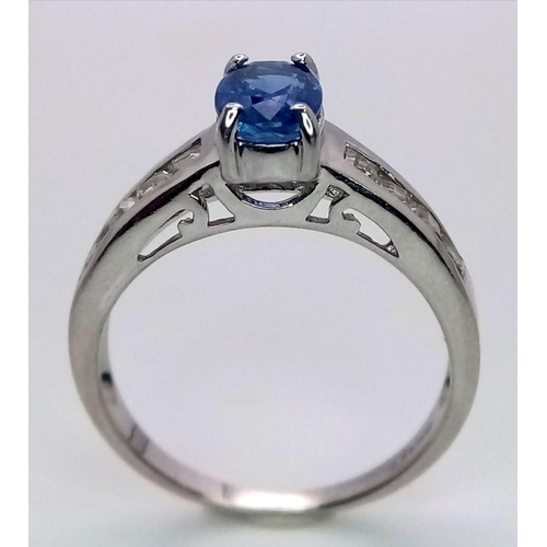 457 - A 9K White Gold Ring set with a 0.95ct Oval Kyanite with White Gemstone Shoulders. Size N. 2.9g tota... 