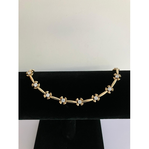 49 - Fabulous 9 carat WHITE and YELLOW GOLD BRACELET Set with sparkling Zirconias. 9.7 grams. 18.5 cm.