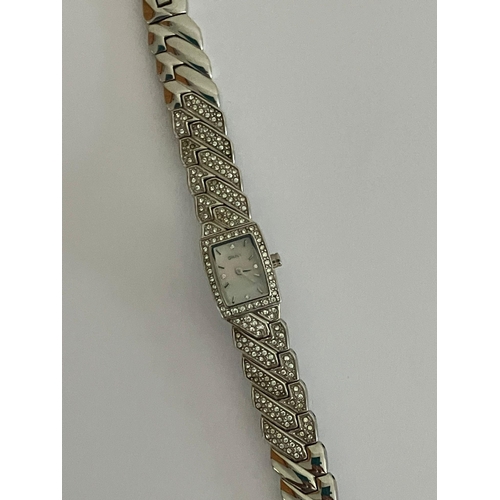 532 - Ladies DKNY Wristwatch. Model NY-4411. Finished in silver tone stainless steel with jewelled bezel a... 