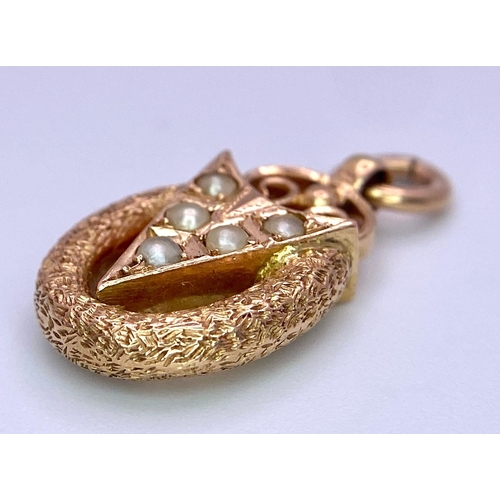 558 - An Excellent Condition 14 Carat Rose Gold Pearl Set Pendant. 2.4cm Length. 1.9 Grams.