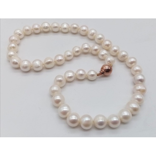 630 - A 45cm Freshwater Cultured Pearl Necklace with a 9K Rose Gold Ball Clasp. Ref: 4696