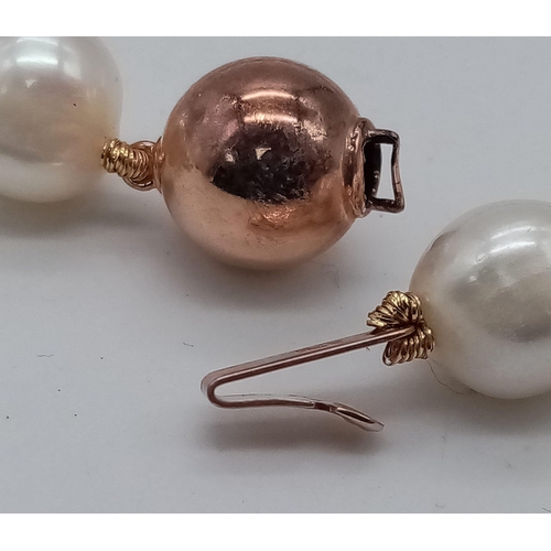 630 - A 45cm Freshwater Cultured Pearl Necklace with a 9K Rose Gold Ball Clasp. Ref: 4696