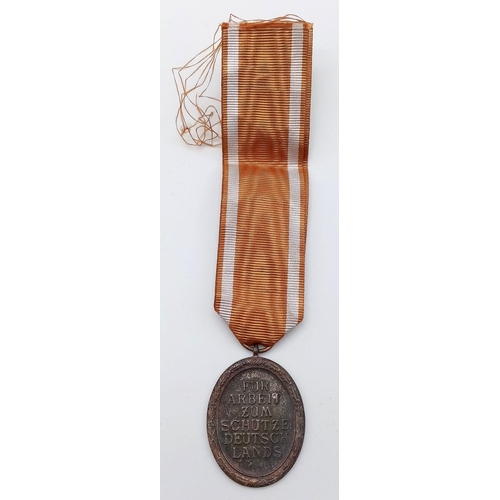 839 - WW2 German West Wall Medal. Awarded to those who built or served on the Seigfried Line.