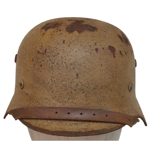 137 - WW2 German M35 Africa Corps Helmet with liner.