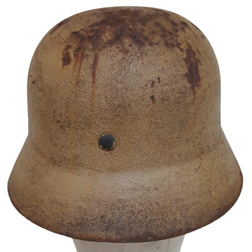 137 - WW2 German M35 Africa Corps Helmet with liner.