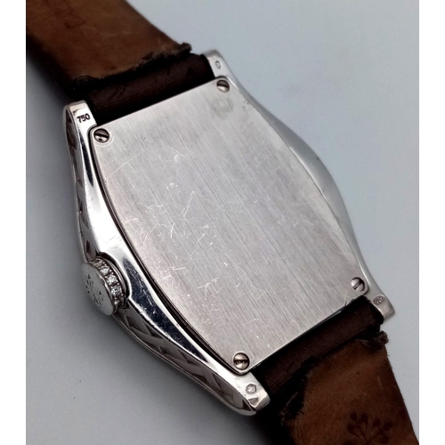 143 - A Patek Philippe 18K White Gold and Diamond Gondolo Ladies Watch. Model 4949. Original strap (slight... 