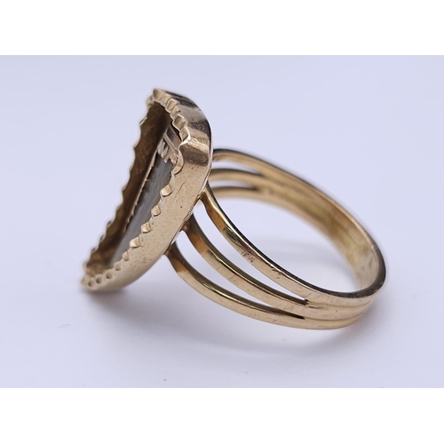 278 - WITHDRAWN A 18K GOLD 3 BAND FERTILITY RING WITH TIGERS TOOTH ENCASED IN 18K GOLD .  7.4gms   size O/... 