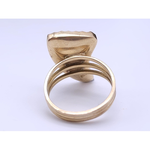 278 - WITHDRAWN A 18K GOLD 3 BAND FERTILITY RING WITH TIGERS TOOTH ENCASED IN 18K GOLD .  7.4gms   size O/... 