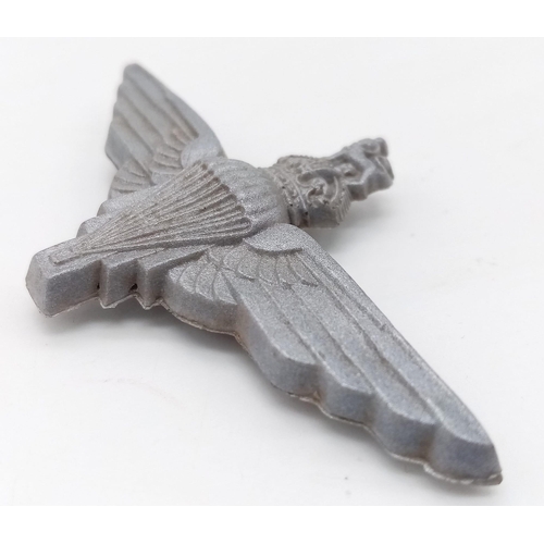 643 - WW2 British Economy Issue Parachute Regiment Plastic Cap Badge.