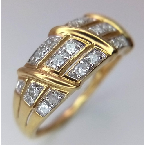 652 - A 9K Yellow Gold Dress Ring with Three Rows of Round Cut Diamonds - 0.25ctw. Size N. 2.55g total wei... 