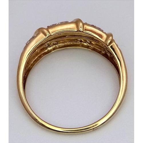 652 - A 9K Yellow Gold Dress Ring with Three Rows of Round Cut Diamonds - 0.25ctw. Size N. 2.55g total wei... 