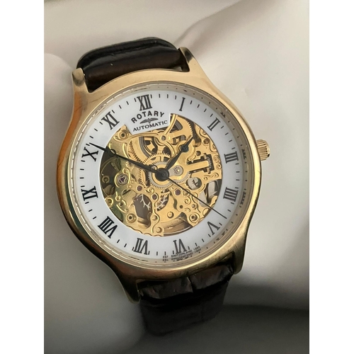 7 - Gentlemans ROTARY AUTOMATIC SKELETON WRISTWATCH. Finished in gold tone with leather strap. Complete ... 