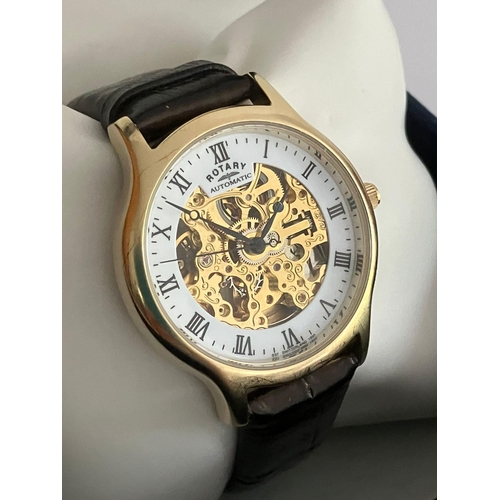 7 - Gentlemans ROTARY AUTOMATIC SKELETON WRISTWATCH. Finished in gold tone with leather strap. Complete ... 