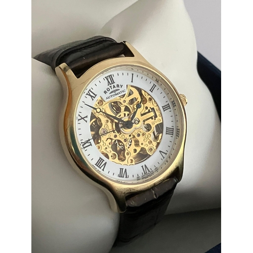 7 - Gentlemans ROTARY AUTOMATIC SKELETON WRISTWATCH. Finished in gold tone with leather strap. Complete ... 