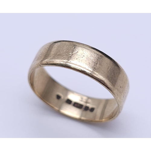 720 - A 9K GOLD BAND RING .  3.1gms   size P