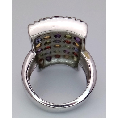 774 - An Impressive Vintage Sterling Silver and Semi-Precious Multi-Gemstone Set Ring.
Size P. The Ring me... 