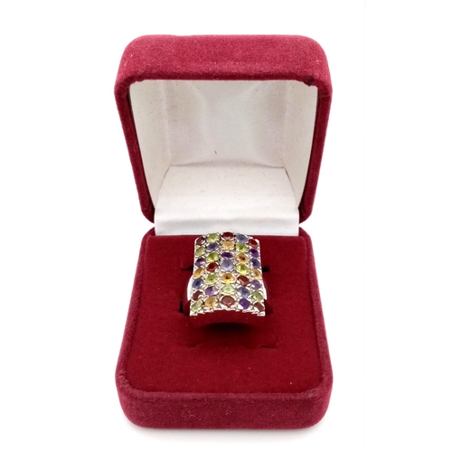 774 - An Impressive Vintage Sterling Silver and Semi-Precious Multi-Gemstone Set Ring.
Size P. The Ring me... 