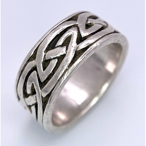 783 - A STERLING SILVER CELTIC BAND RING SIZE Q 7.7G & A CELTIC STUD EARRINGS 1.6G & A CELTIC PENDANT 32mm... 