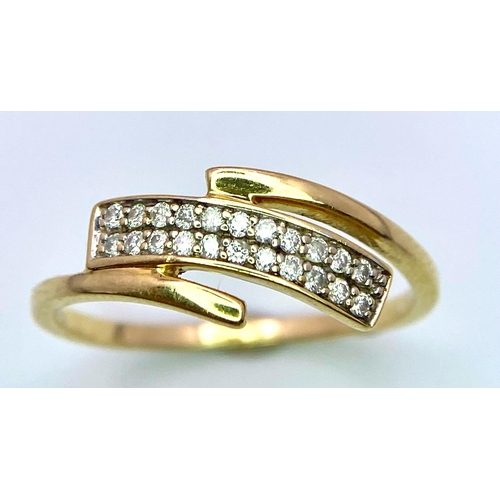 864 - 18K Yellow Gold Diamond Crossover Ring. 2.2g total weight. Size M1/2. (dia 0.11ct). Ref: SH2696H