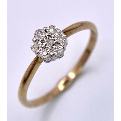 1007 - 9K Yellow gold Diamond Cluster Ring. 1.3g weight. Size N (dia 0.07ct). Ref: TB72