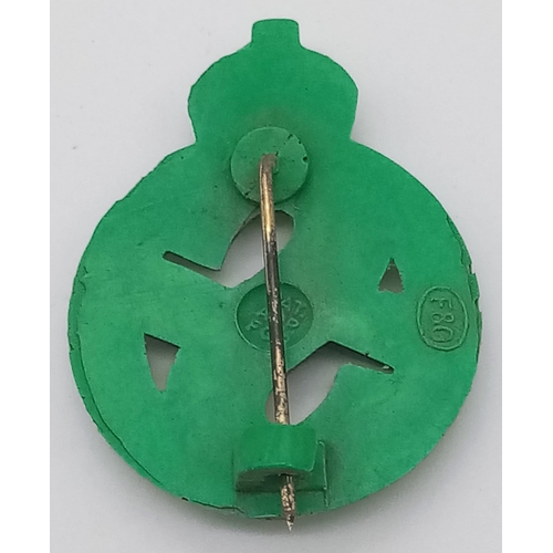 1054 - WW2 British Homefront Green Plastic Salvage Steward’s Badge in the rarer green colour.