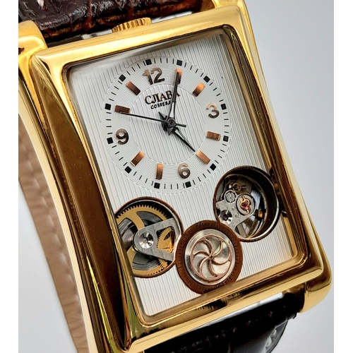 1196 - A Men’s Gold Tone, Skeleton Design, Tank Style Watch by Cjiaba. 
36mm Case Width. Full working order... 