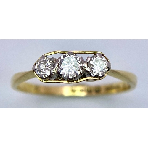 1490 - A VINTAGE 18K GOLD THREE STONE DIAMOND RING .   2.6gms   size S