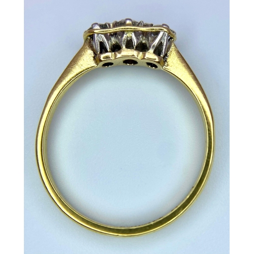 1490 - A VINTAGE 18K GOLD THREE STONE DIAMOND RING .   2.6gms   size S