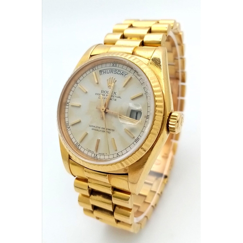 15 - AN 18K GOLD ROLEX OYSTER PERPETUAL DAY-DATE WITH SOLID 18K GOLD STRAP , WHITE DIAL AND AUTOMATIC MOV... 