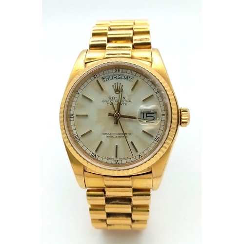 15 - AN 18K GOLD ROLEX OYSTER PERPETUAL DAY-DATE WITH SOLID 18K GOLD STRAP , WHITE DIAL AND AUTOMATIC MOV... 