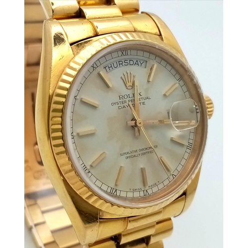 15 - AN 18K GOLD ROLEX OYSTER PERPETUAL DAY-DATE WITH SOLID 18K GOLD STRAP , WHITE DIAL AND AUTOMATIC MOV... 