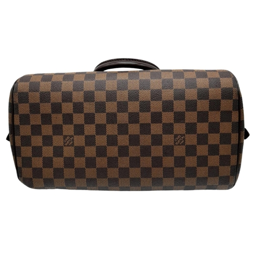 176 - A Louis Vuitton Damier Ebene 'Ribera' Handbag. Leather exterior with two rolled leather handles, gol... 