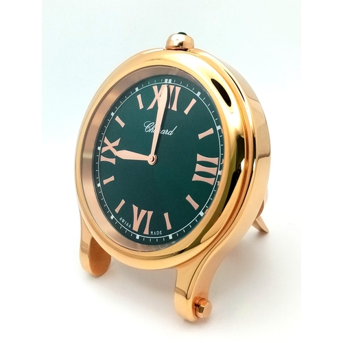 185 - A Chopard Happy Sport Rose Gold Plated Table Clock. Quartz movement. Green dial with Roman numerals.... 