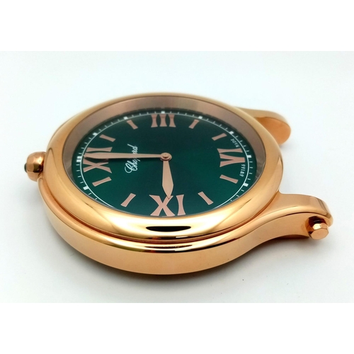 185 - A Chopard Happy Sport Rose Gold Plated Table Clock. Quartz movement. Green dial with Roman numerals.... 