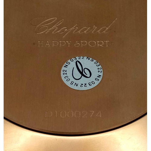 185 - A Chopard Happy Sport Rose Gold Plated Table Clock. Quartz movement. Green dial with Roman numerals.... 