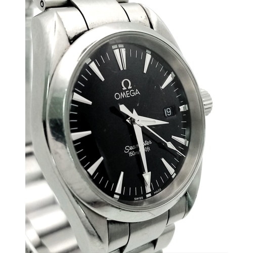 192 - An Omega Seamaster Aqua Terra Quartz Gents Watch. Stainless steel bracelet and case - 36mm. Black di... 