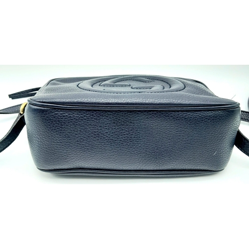 316 - A Gucci Blue Soho Disco Crossbody Bag. Grained leather exterior with the signature tassel, stitched ... 