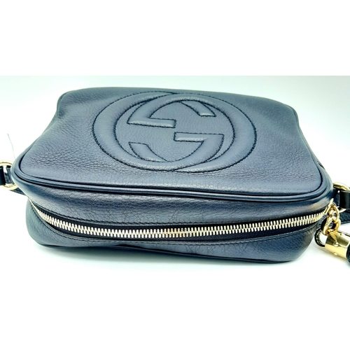 316 - A Gucci Blue Soho Disco Crossbody Bag. Grained leather exterior with the signature tassel, stitched ... 