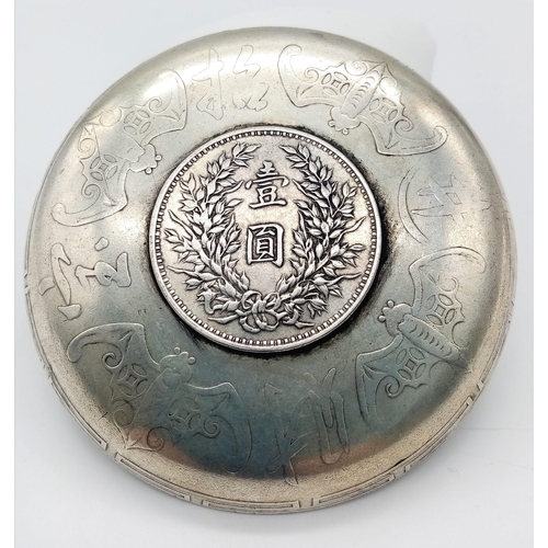 572 - An Antique Chinese Silver, Yuan Coin Set, Dragon & Bat Detail Dish. 
Circa 1914, it measures 9.3cm D... 