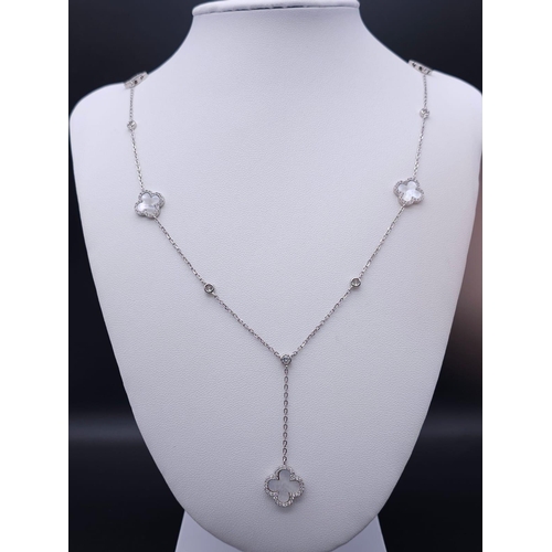 661 - A Long Silver Necklace Alternately Set with Mother of Pearl and White Round CZ Stones. 70cm. Ref: 70... 