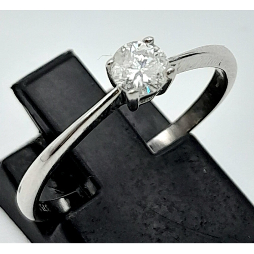 721 - A 9K White Gold Round Brilliant Cut Diamond Solitaire Ring. Size O. 0.25ct. 1.5g total weight. Ref: ... 