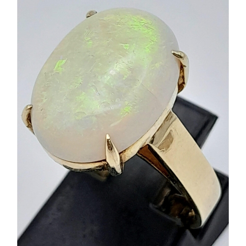 797 - A 14K Yellow Gold Ring Set with a Large 3ct White Opal. Size K/L. 5.26g total weight. Ref: 7308