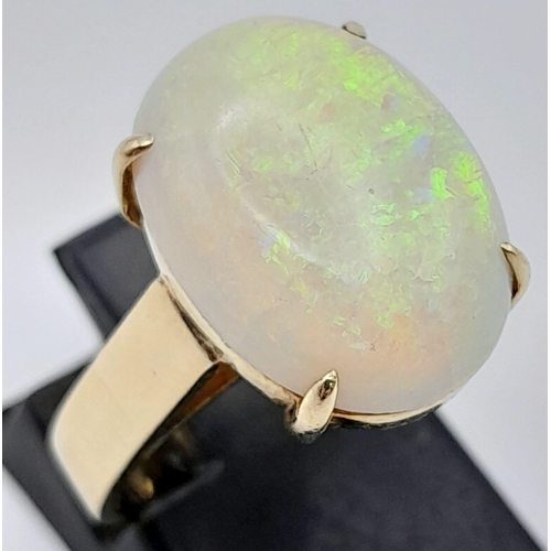 797 - A 14K Yellow Gold Ring Set with a Large 3ct White Opal. Size K/L. 5.26g total weight. Ref: 7308