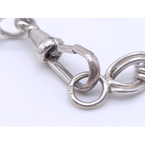 859 - A Vintage Sterling Silver Albert Chain with Two Sterling Silver Charms. 
One of a Victorian Lady and... 