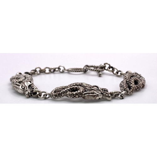 873 - A Very Unique Sterling Silver Dragon Detail T- Bar Bracelet. 20cm Length, 1cm Width. Gross Weight 15... 