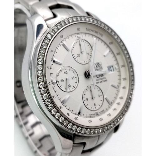 36 - A gents TAG HEUER - LINK automatic watch with diamond set bezel. Stainless steel construction, 42 mm... 