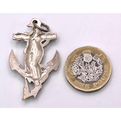 1112 - A Sterling Silver Mermaids on Anchor Pendant. Approximately 42mm length, 9.3g weight.