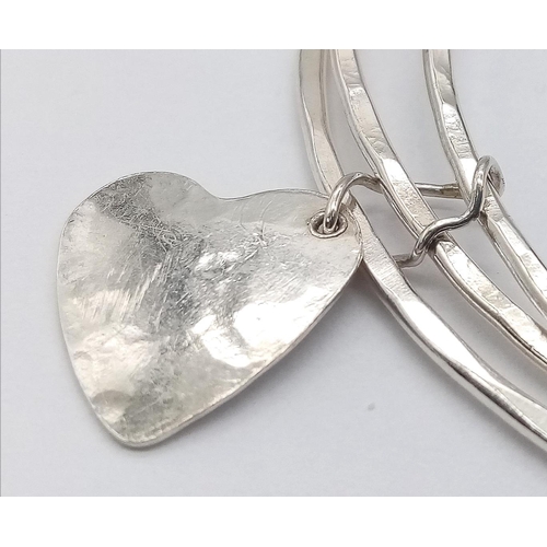 1150 - Bespoke Made Silver Three Band Heart Pendant Bracelet. 6.5cm Inner Width. 12.97 Grams. In Presentati... 