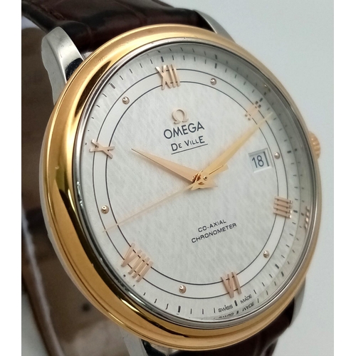 122 - An Omega Deville Prestige Co-Axial Gents Watch. Brown leather strap. Gilded stainless steel case - 3... 