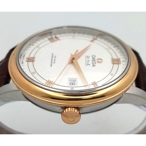 122 - An Omega Deville Prestige Co-Axial Gents Watch. Brown leather strap. Gilded stainless steel case - 3... 